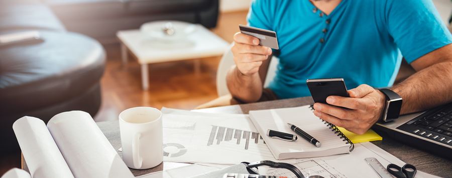 Man using his business credit card