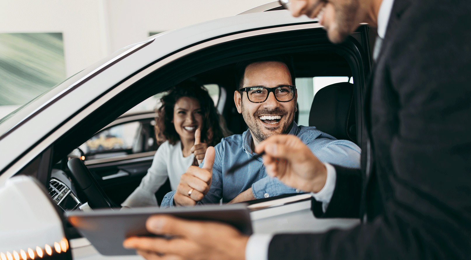 Happy Couple just bought a new car